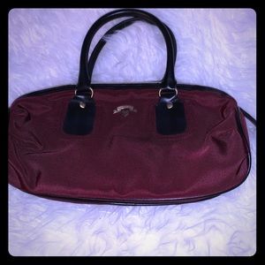 Victoria’s Secret burgundy handbag.